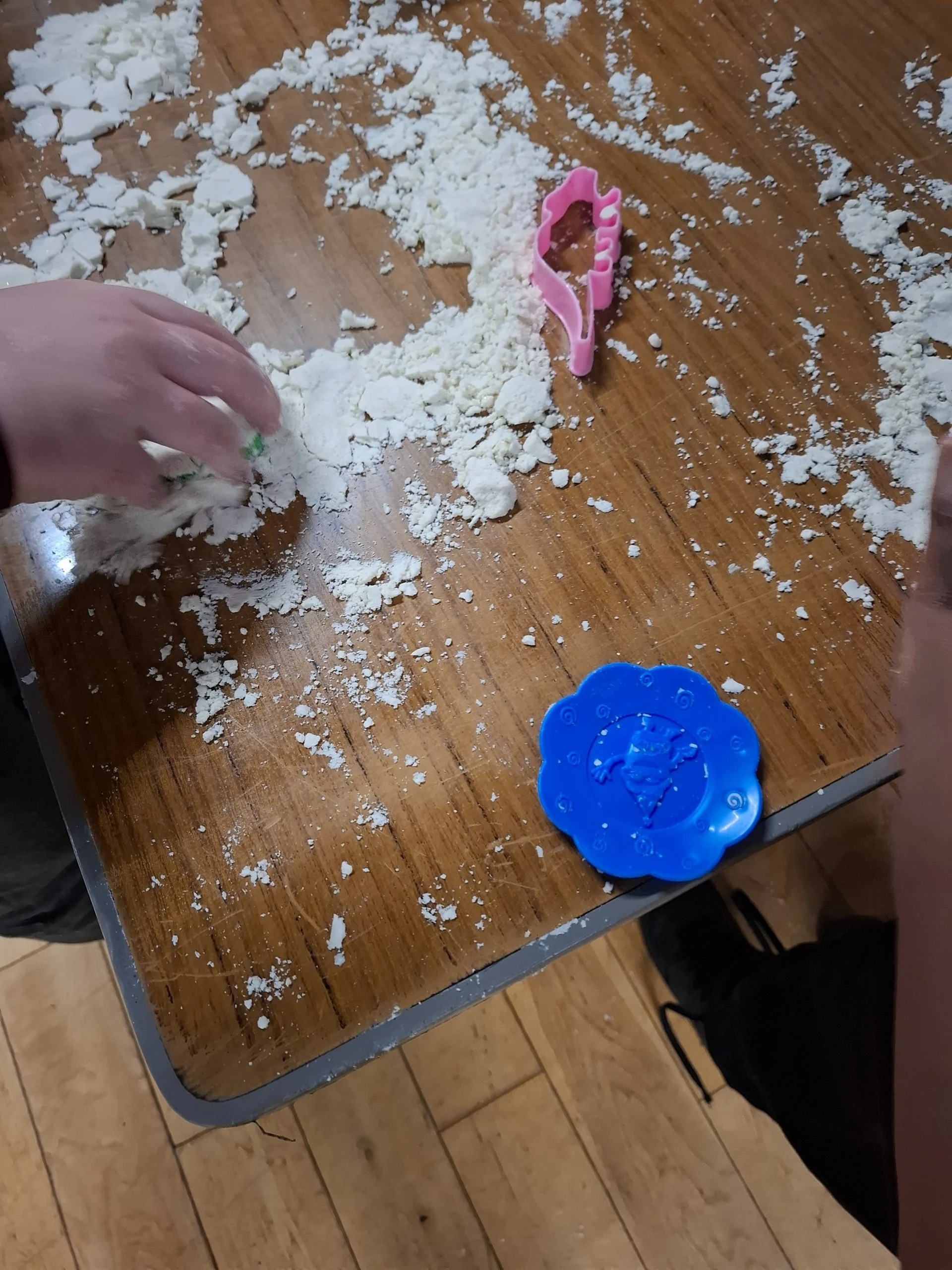 Children enjoying creative activities at Happy Hearts Out of School Club